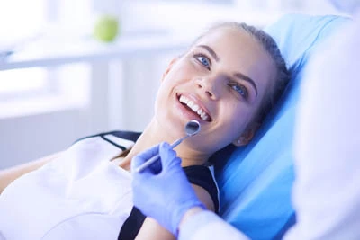 woman getting a dental checkup at Ankeny Dental Professionals in Ankeny, IA
